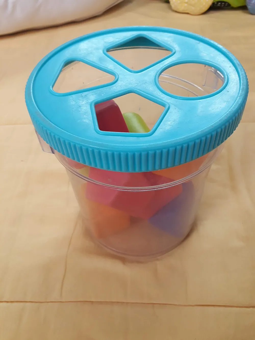 Photo of a similar item: Melissa & Doug K's Kids Take-Along Shape Sorter